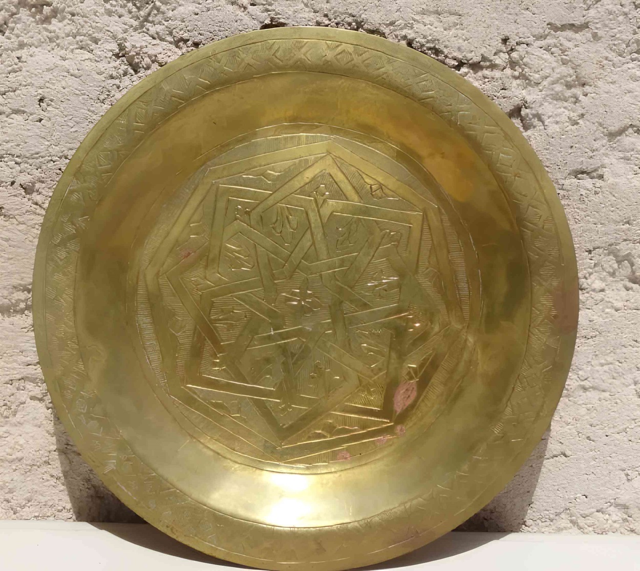 Armadura y arma damasquinada que representa la perfeccin artesanal